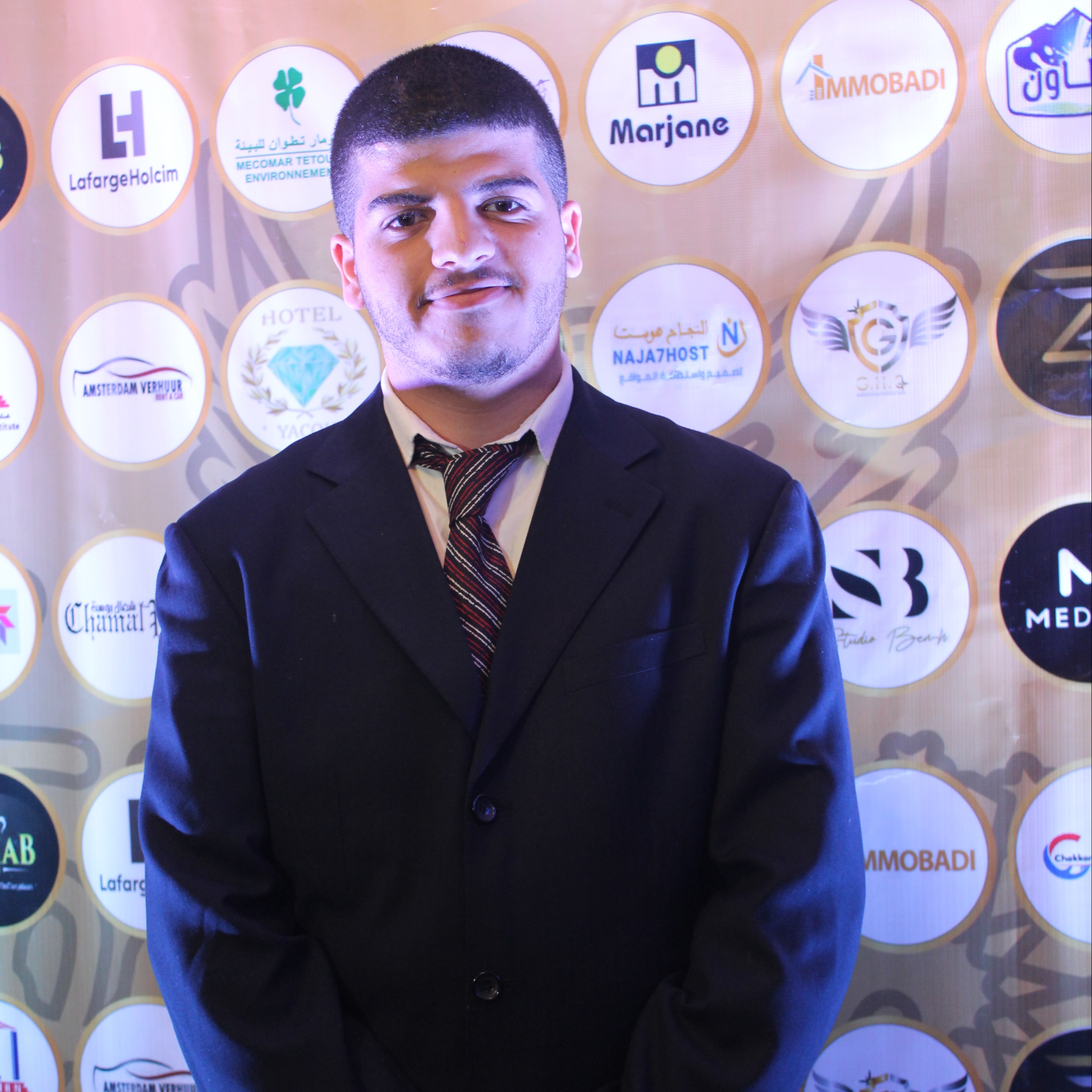 محمد رضا مبتسم